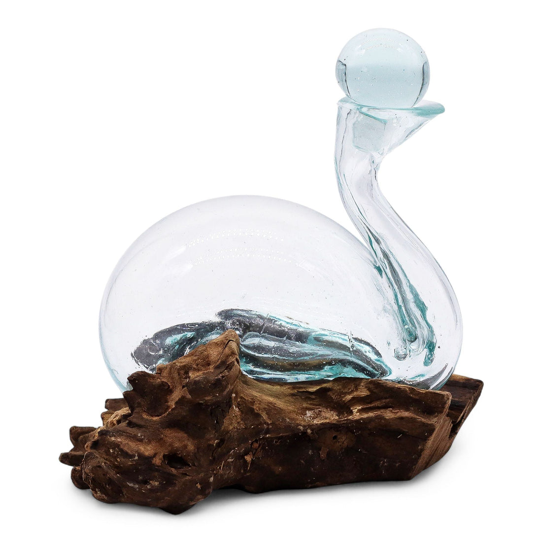 Hand-blown recycled glass duck decanter with stopper on reclaimed wood