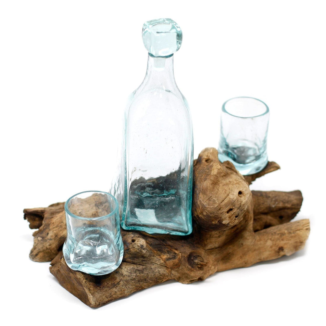 Handmade recycled glass whisky decanter set on reclaimed wood, a sustainable Christmas gift
