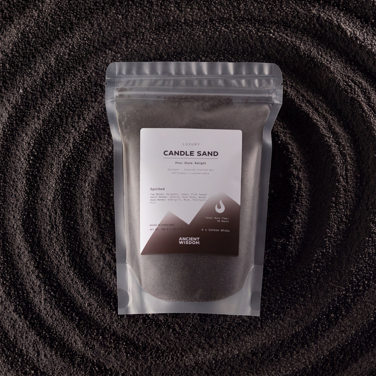 Spirited fragranced candle sand in black