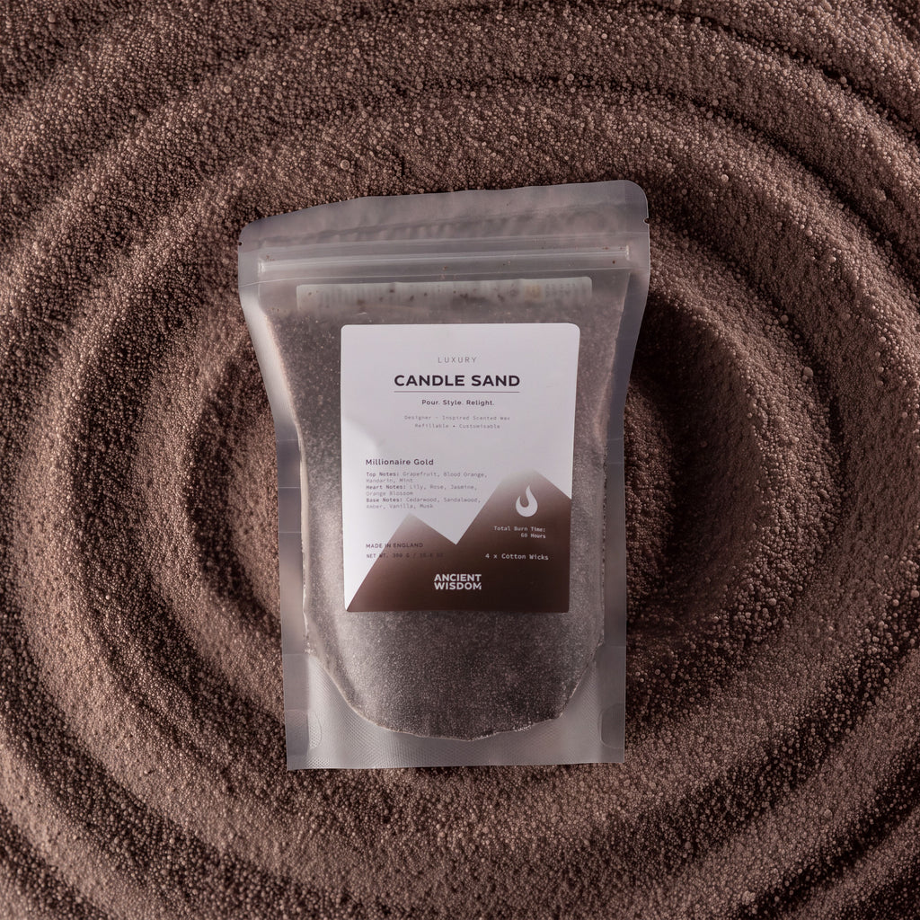Millionaire Gold fragranced candle sand in chocolate brown