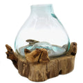 Hand-blown recycled molten glass fish tank fused over reclaimed Balinese gamal wood base with built-in LED light