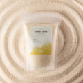 Blush Bloom fragranced candle sand in warm honey
