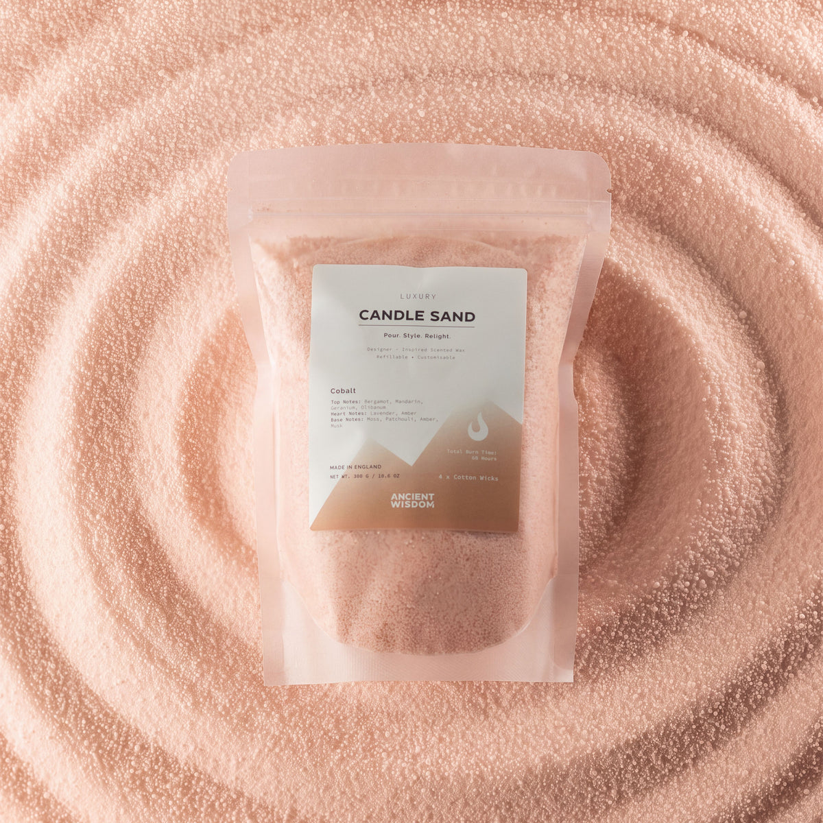 Cobalt fragranced candle sand in taupe orange