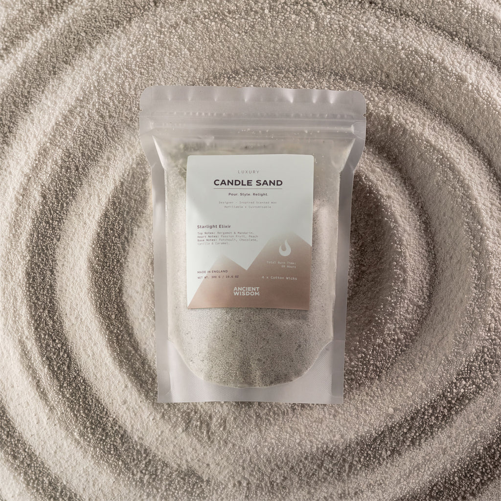 Starlight Elixir fragranced candle sand in white